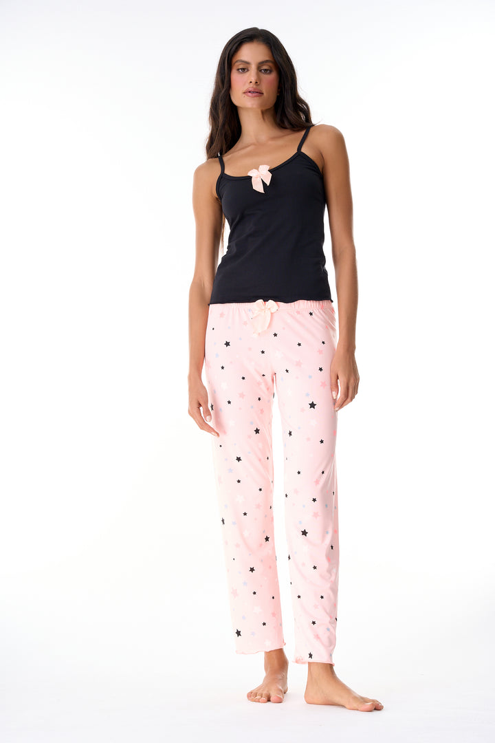 Imagen del producto: Conjunto pantalón naranja estrellas negras blancas gris blusa negra